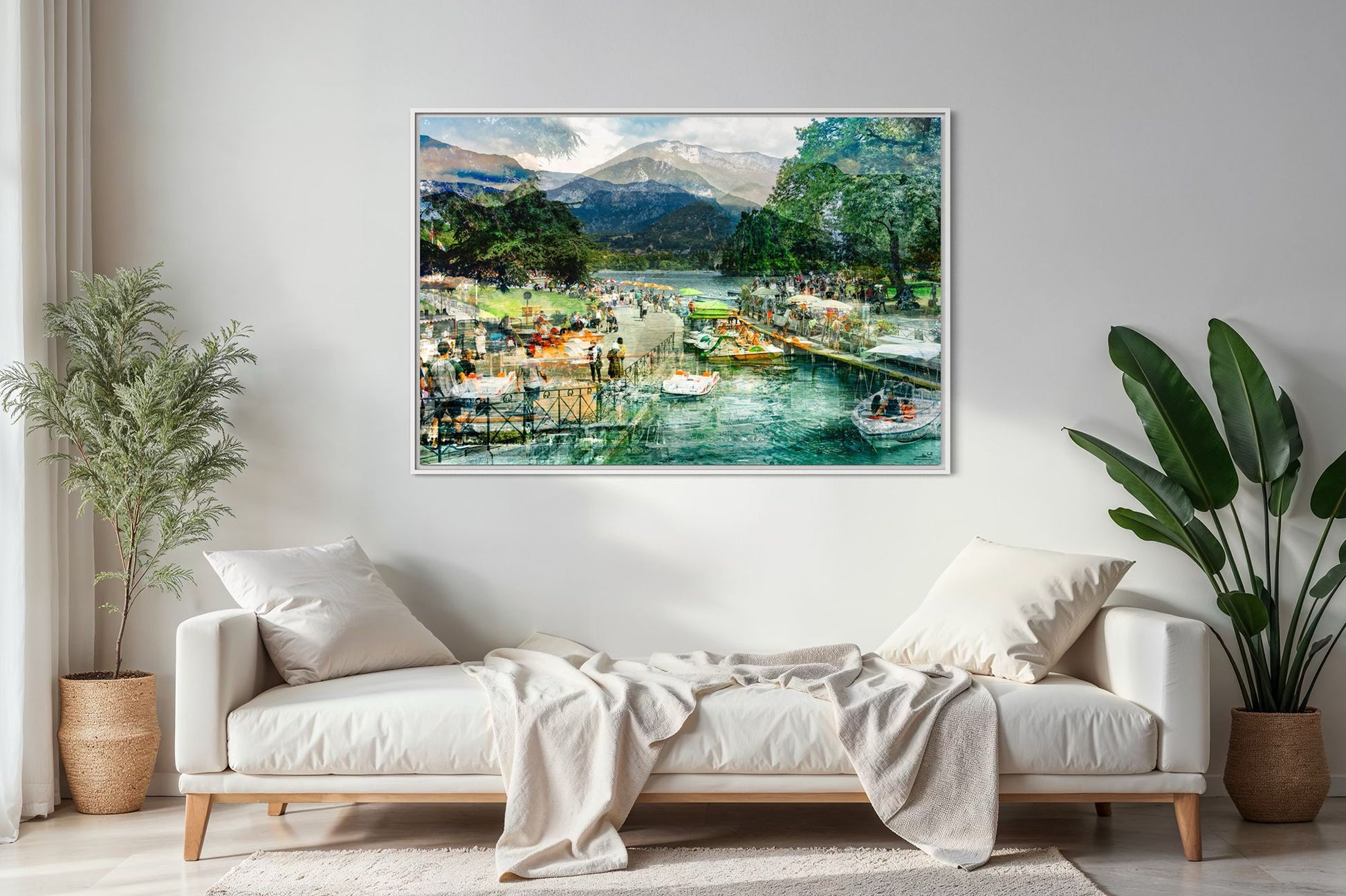 Afternoon Walk at Lake Annecy layered photography print in a white floater frame, displayed above a daybed in a modern living room