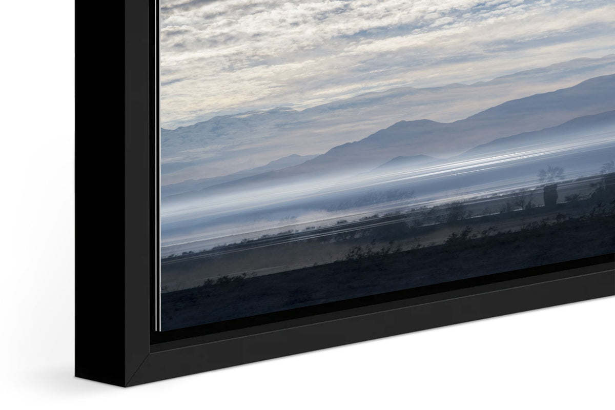 Blue Salton Sea photograph under acrylic glass with black floater frame, close up detail