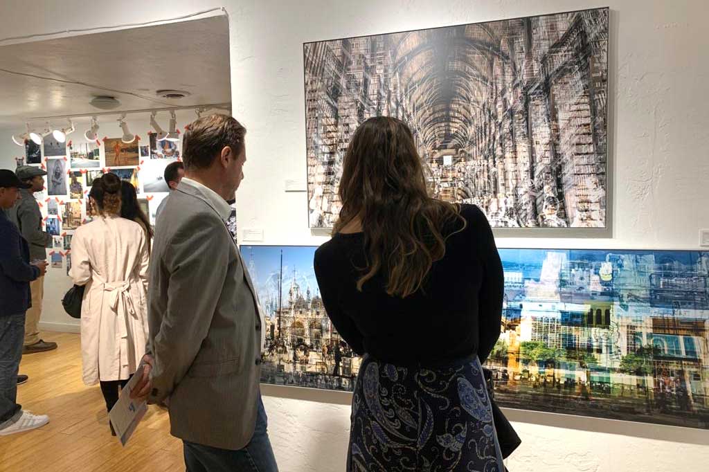 Charlotte Fonne's Trinity Library, Basilica di San Marco and Hermosa Cuba at Aqua Art Miami 2019, with visitors looking at the work