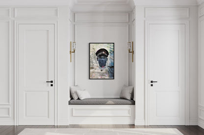 Policeman in Nassau layered portrait photography print in a black floater frame, displayed above a built-in bench in a white paneled hallway