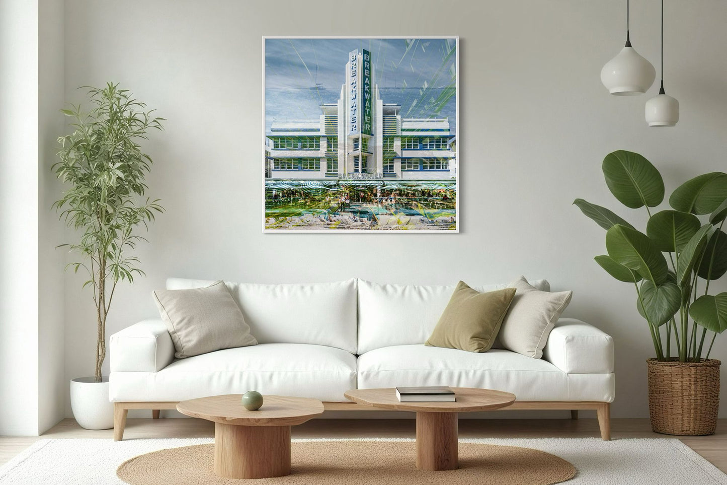 The Breakwater layered photography print displayed above a white sofa in a modern living room interior