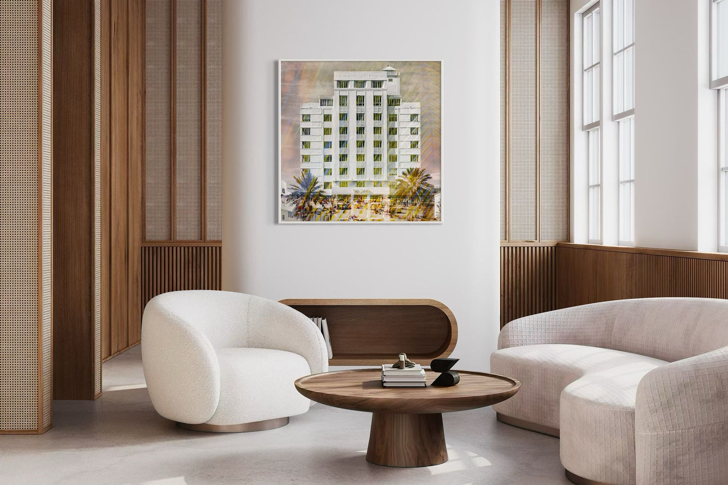 The Tides layered photography print displayed on a wall in a modern living room with wood paneling and bouclé chairs