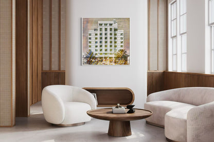 The Tides layered photography print displayed on a wall in a modern living room with wood paneling and bouclé chairs