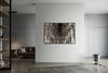 Trinity Library layered photography print in a black floater frame, displayed on a white wall in a concrete loft living room